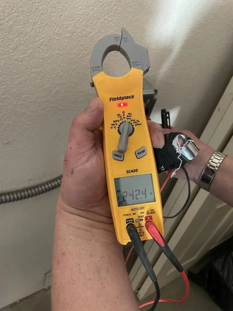 Voltage testing with clamp meter during Electrical Installation Services in Rocklin